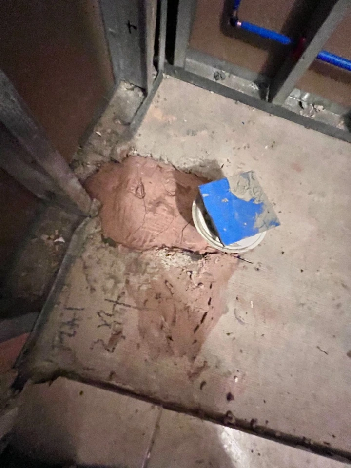 Close-up photograph of a firestopped floor penetration before cover